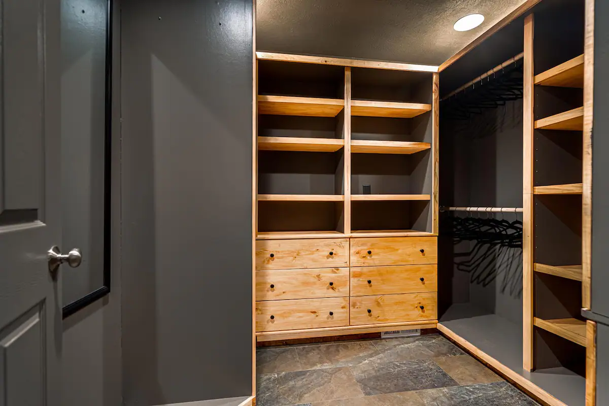 The well-ventilated master walk-in closet provides ample space to double as a baby room, thoughtfully equipped with a 4moms pack 'n play, mattress, linens, and a sound machine for your family’s comfort.