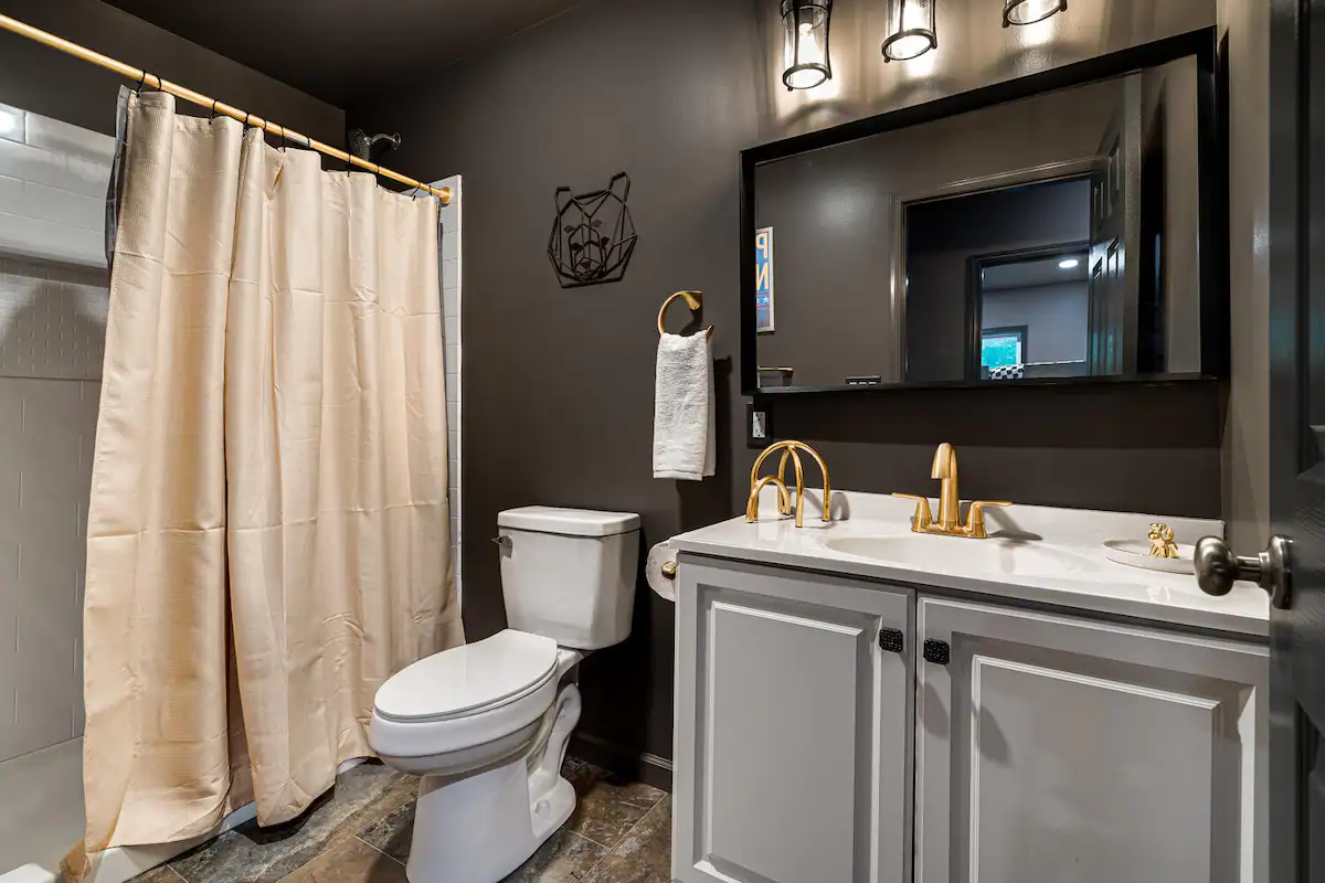 The Retreat’s full bathroom is a stylish sanctuary, featuring modern fixtures and elegant finishes for a serene and refreshing experience.